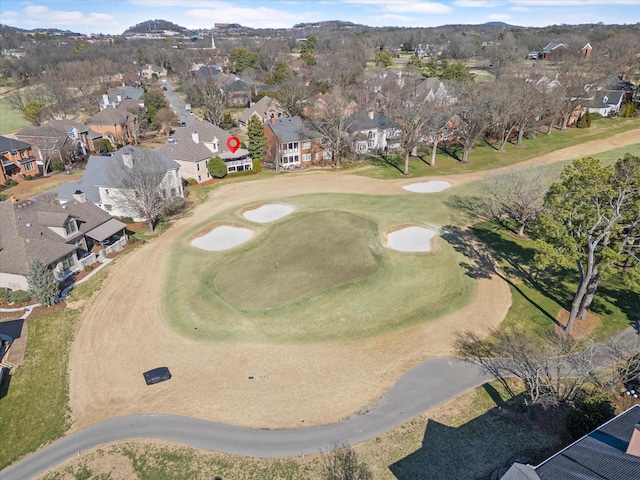 bird's eye view featuring view of golf course and a residential view