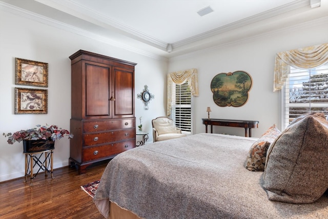 bedroom with dark wood-style floors, ornamental molding, and baseboards