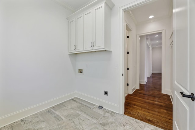 clothes washing area featuring ornamental molding, washer hookup, hookup for an electric dryer, and baseboards