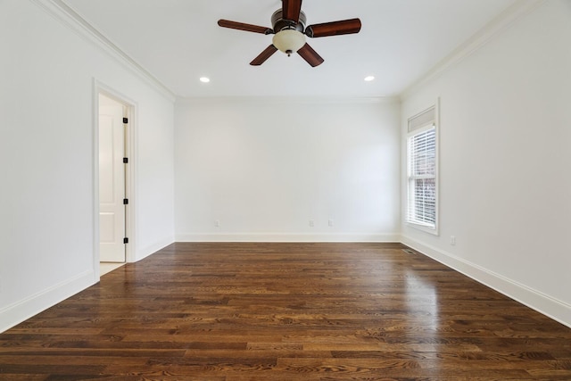 spare room with baseboards, recessed lighting, wood finished floors, and crown molding