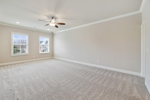 carpeted empty room with recessed lighting, crown molding, baseboards, and ceiling fan