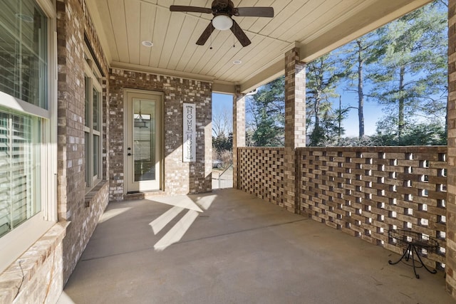 view of patio featuring ceiling fan