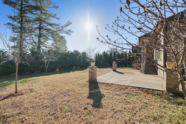 view of yard with a patio area