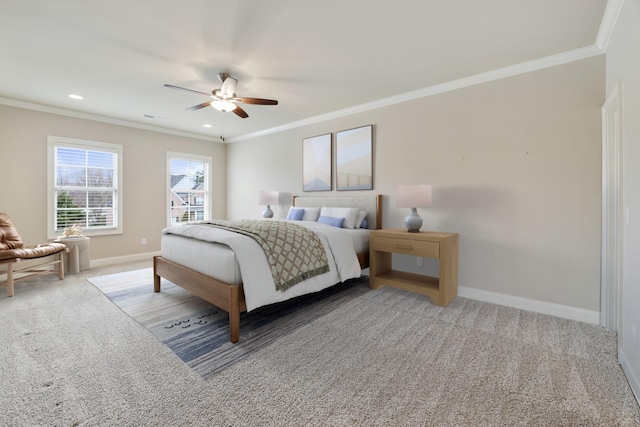 bedroom with ornamental molding, carpet flooring, and baseboards