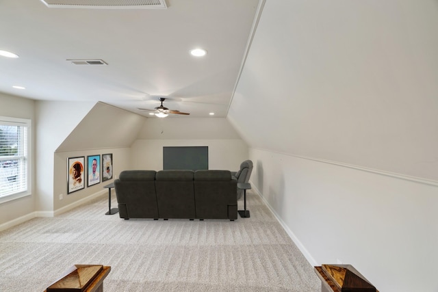 living room with carpet, visible vents, vaulted ceiling, and baseboards