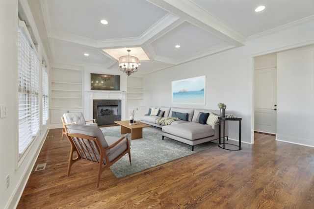 living room with a premium fireplace, coffered ceiling, wood finished floors, baseboards, and ornamental molding