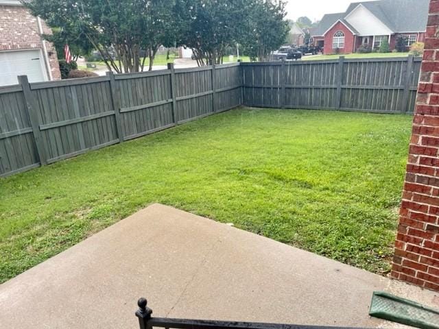 view of yard featuring a fenced backyard