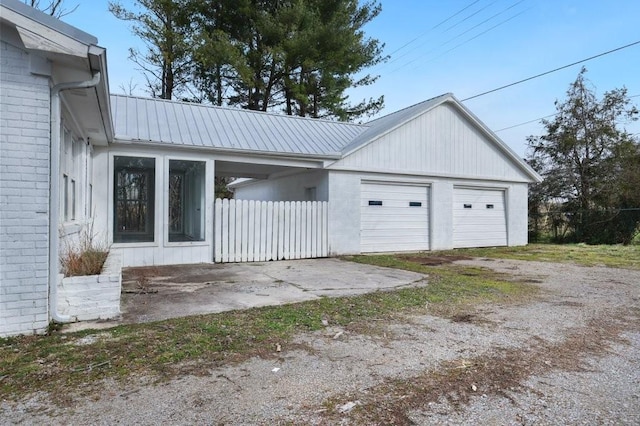 garage featuring fence