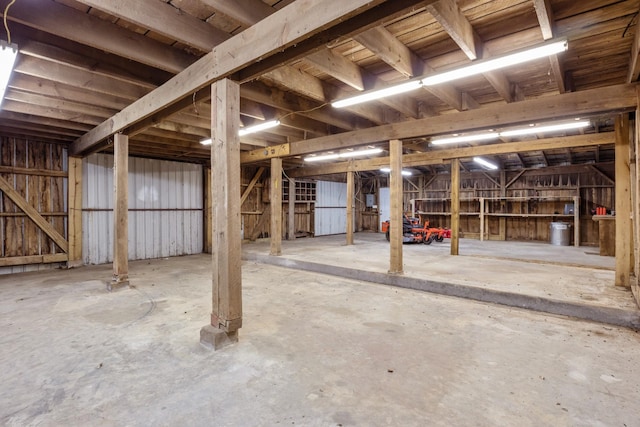 misc room featuring unfinished concrete floors