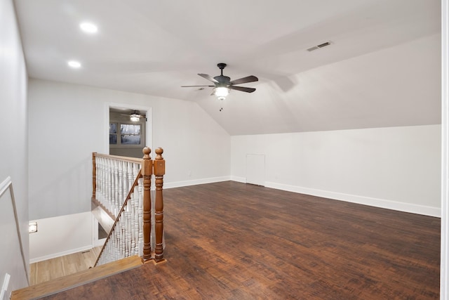 bonus room featuring recessed lighting, wood finished floors, visible vents, baseboards, and vaulted ceiling