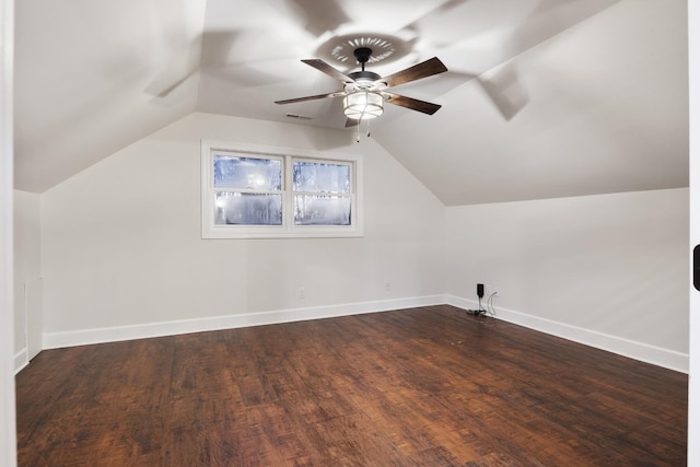 bonus room with baseboards, visible vents, and vaulted ceiling