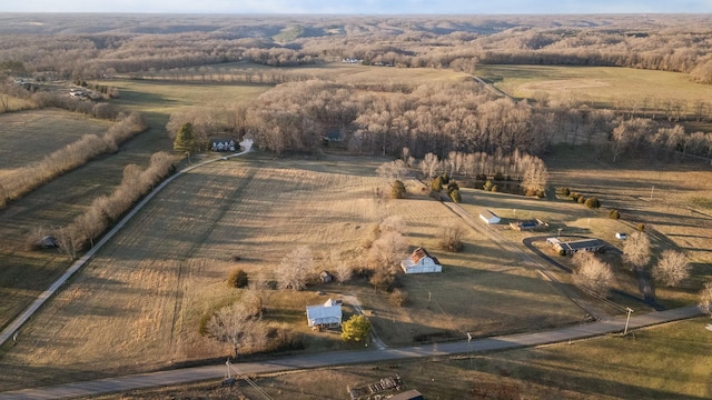 birds eye view of property featuring a rural view