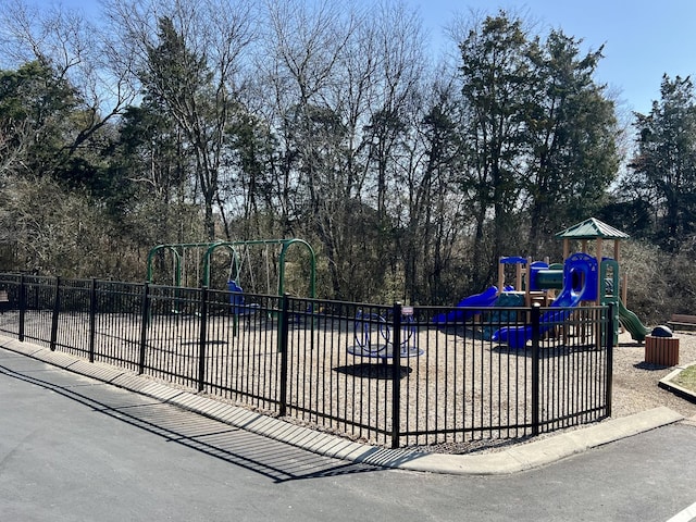 community jungle gym with fence