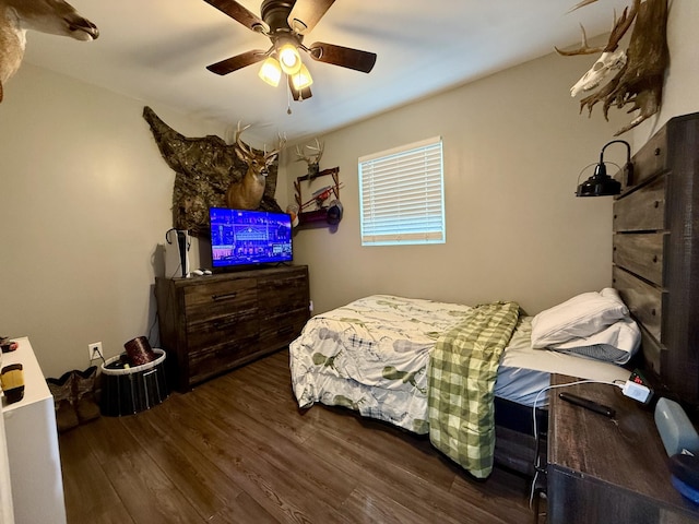 bedroom featuring ceiling fan and wood finished floors