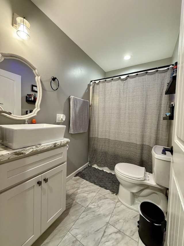 bathroom with baseboards, toilet, a shower with curtain, marble finish floor, and vanity