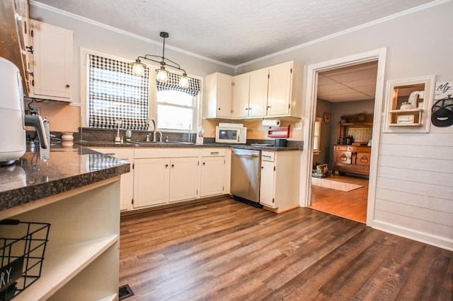 kitchen featuring white microwave, dark wood-type flooring, ornamental molding, a sink, and dishwasher