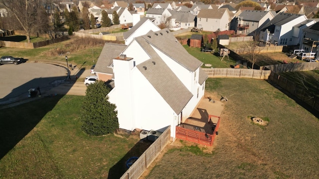 birds eye view of property with a residential view