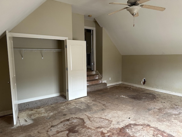 bonus room with vaulted ceiling and a ceiling fan