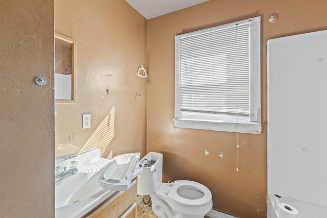 bathroom featuring toilet