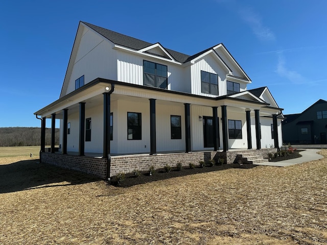 modern farmhouse featuring a porch