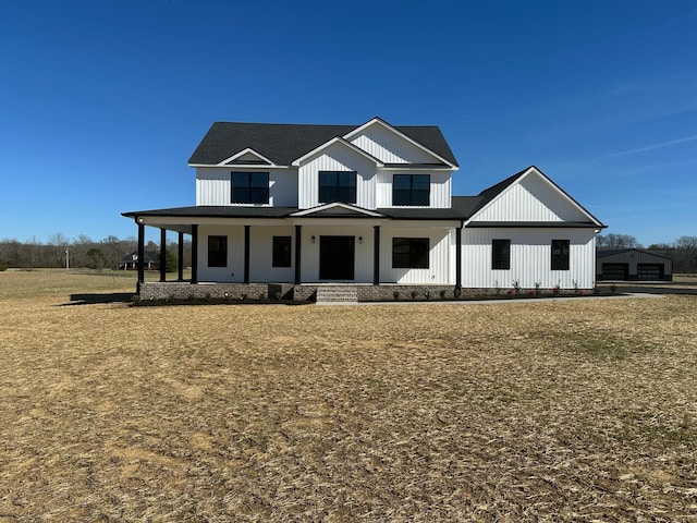 modern farmhouse style home with a porch