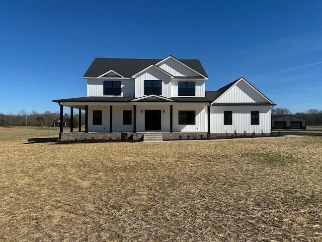 modern farmhouse style home with covered porch