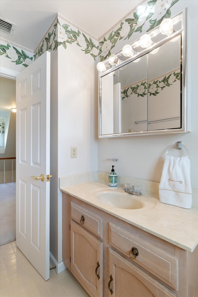 bathroom featuring visible vents and vanity