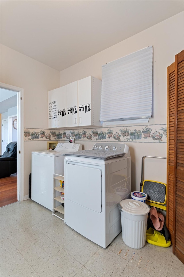 washroom featuring laundry area and independent washer and dryer