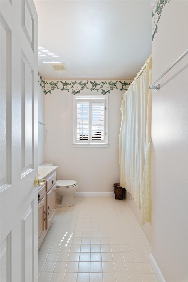 full bathroom featuring baseboards, toilet, curtained shower, tile patterned flooring, and vanity