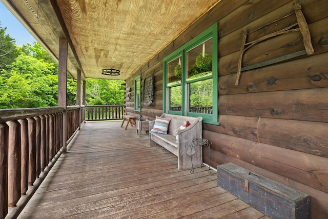 wooden terrace featuring a porch