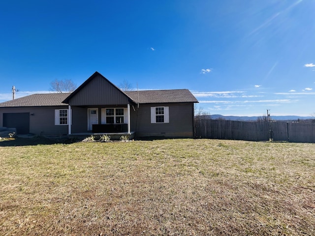 single story home with a garage, crawl space, fence, and a front lawn