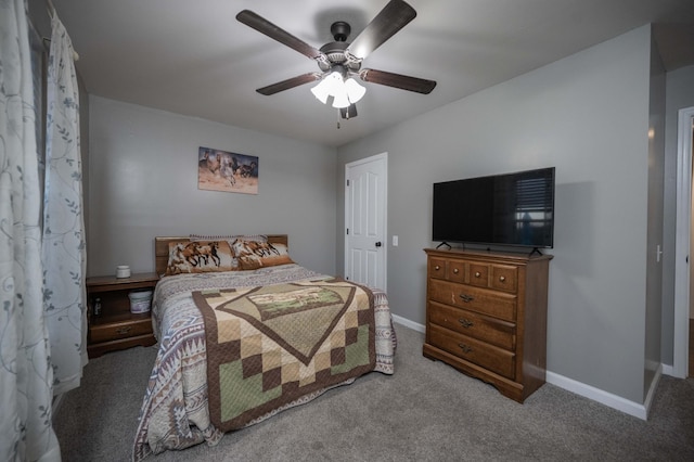 bedroom featuring carpet flooring, ceiling fan, and baseboards