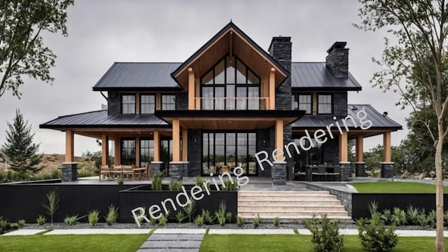 rear view of property featuring stone siding, a standing seam roof, metal roof, and a chimney