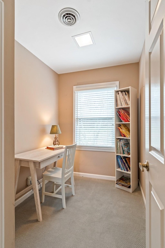 home office with carpet, visible vents, and baseboards