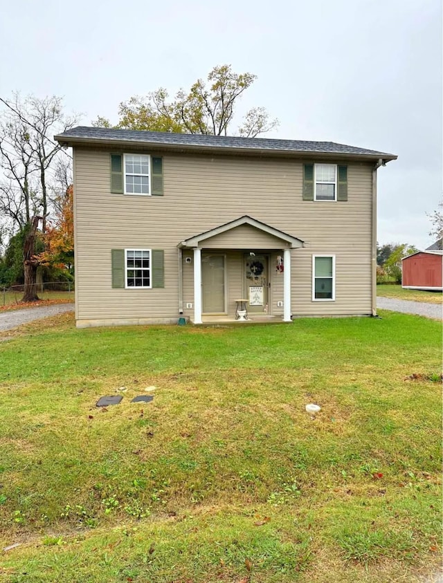 view of front of house featuring a front lawn