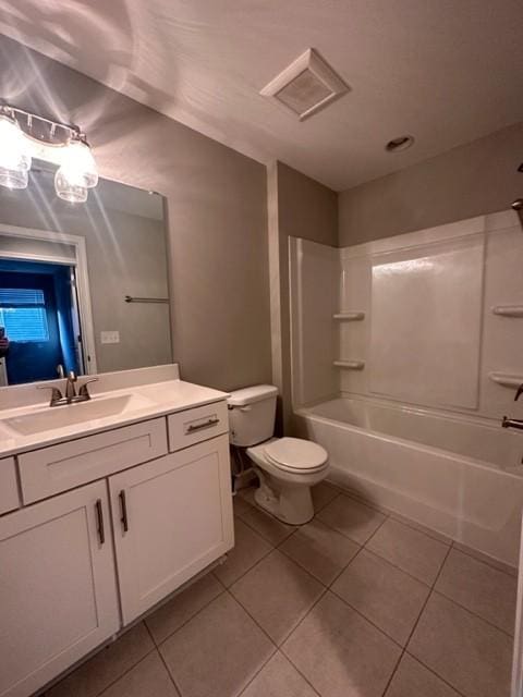 full bath with visible vents, toilet, vanity, shower / tub combination, and tile patterned floors