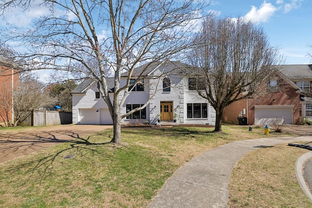 view of front of property with a front yard and fence