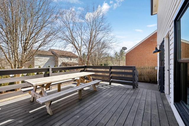 wooden deck with outdoor dining space