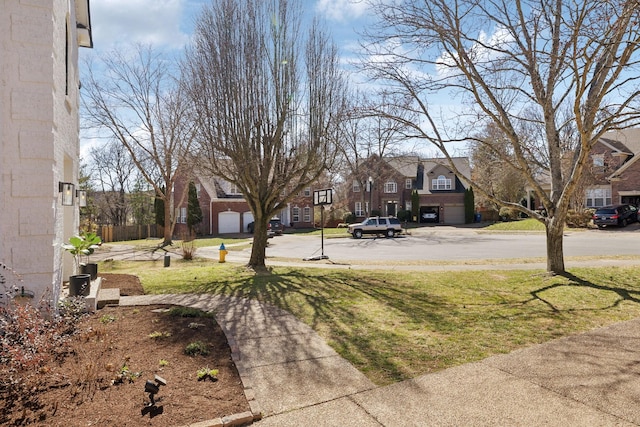 view of yard with a residential view