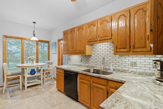 kitchen with a sink, hanging light fixtures, decorative backsplash, dishwasher, and brown cabinetry