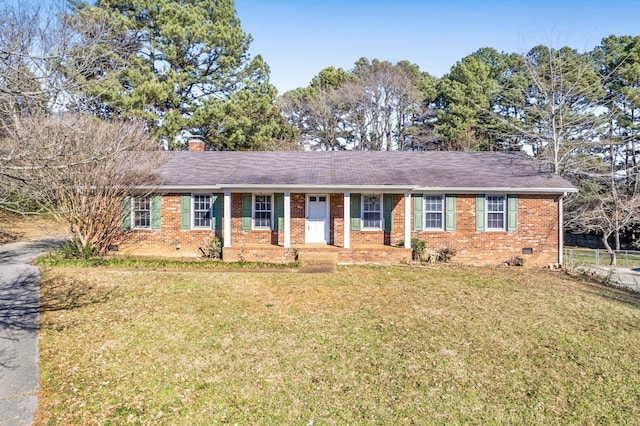 single story home with brick siding, a chimney, crawl space, fence, and a front lawn