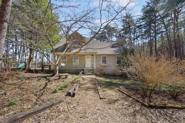 view of front of home with a playground