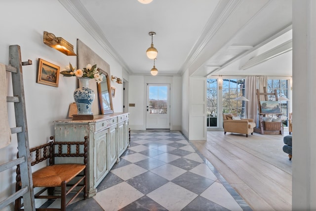 interior space featuring baseboards, crown molding, and tile patterned floors