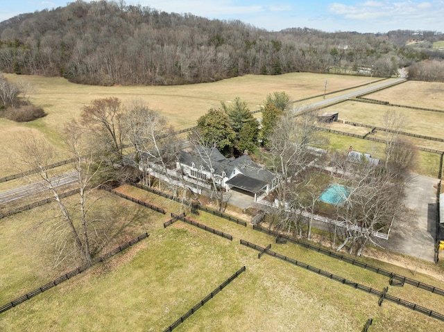 birds eye view of property featuring a rural view