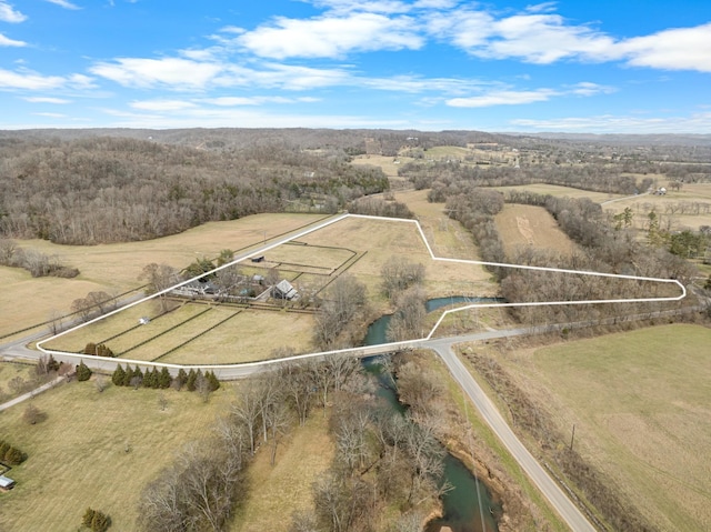 birds eye view of property featuring a rural view