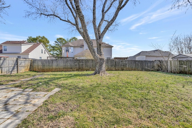 view of yard featuring a fenced backyard