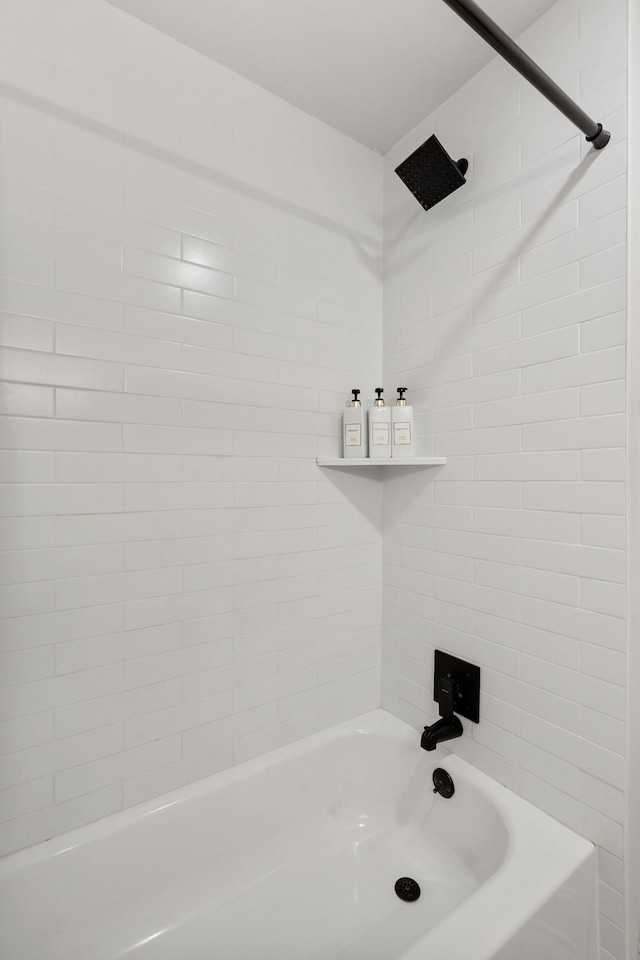 full bath featuring  shower combination