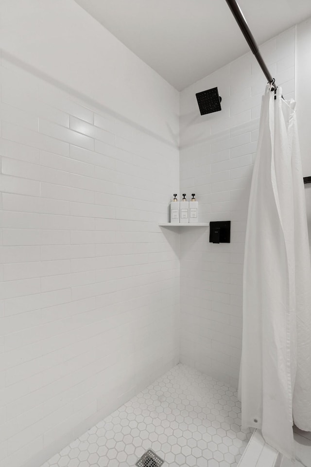 full bathroom featuring a stall shower