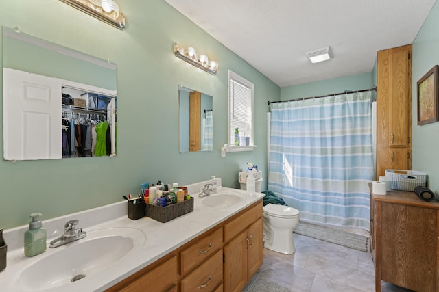 104 Allen St, Alexandria, TN 37012 - bathroom featuring toilet, curtained shower, double vanity, and a sink