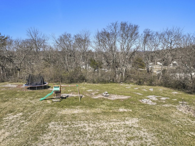 104 Allen St, Alexandria, TN 37012 - view of yard with a trampoline and a playground